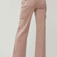 High rise wide leg cargo jeans with flap pockets, showcasing trendy style and functionality. Perfect for casual outings.