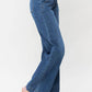 Stylish high-rise Judy Blue wide leg jeans with double button detail, moderate stretch, and pocketed design for a chic casual look.