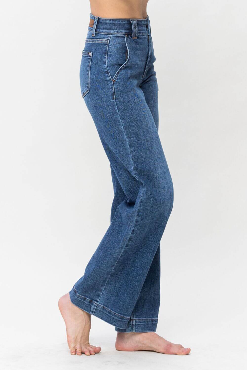 Stylish high-rise Judy Blue wide leg jeans with double button detail, moderate stretch, and pocketed design for a chic casual look.