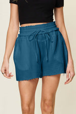 DOUBLE TAKE Full Size Texture Raw Trim Drawstring Shorts at Bella Road