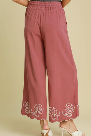 Umgee plus size wide leg pants in mauve with scalloped hem and floral embroidery, perfect for warm weather styling.