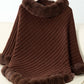 Stylish brown Bella Road poncho with fuzzy trim and textured design, perfect for cozy chilly days.