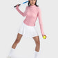 Model in a pink zip-up long sleeve sports jacket with a tennis racket and ball, ready for action in sporty style.