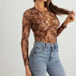 TASHA APPAREL Abstract Mesh Lace-Up Long Sleeve Bodysuit at Bella Road