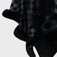 Cozy Bella Road fuzzy checkered poncho with elegant black and gray pattern, perfect for stylish fall layering.