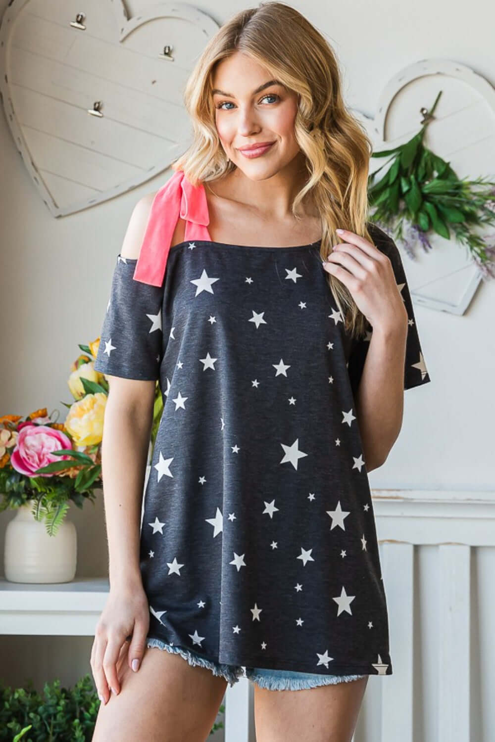 HEIMISH Full Size Star Print Asymmetrical Neck Short Sleeve Top at Bella Road