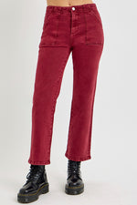 Risen full size high-rise straight jeans with patch pockets in red, styled with black boots, highlighting a trendy and classic look.