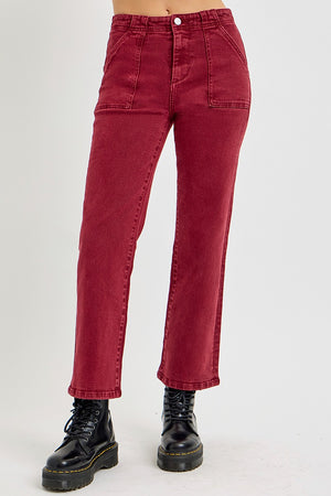 Risen full size high-rise straight jeans with patch pockets in red, styled with black boots, highlighting a trendy and classic look.