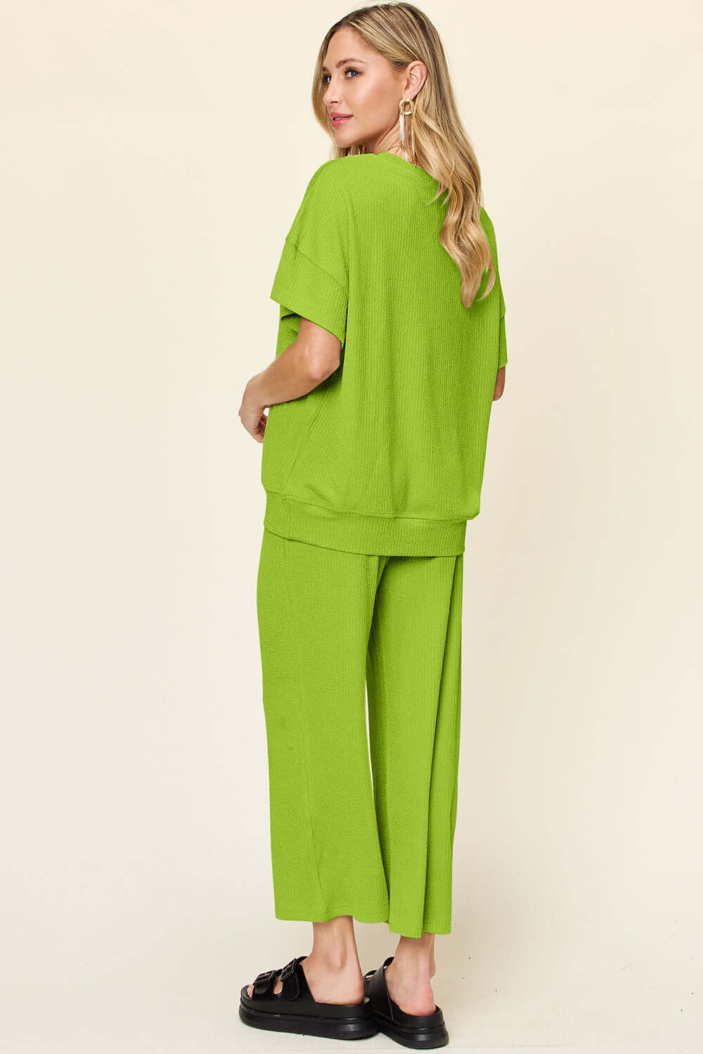 DOUBLE TAKE Full Size Texture Round Neck Short Sleeve T-Shirt and Wide Leg Pants at Bella Road