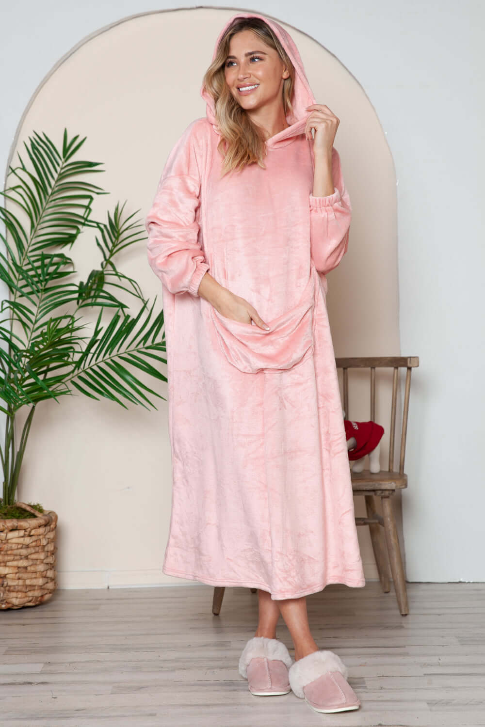 Cozy dusty pink hooded midi lounge dress with pockets, perfect for fall lounging and chilly days.