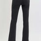 High-rise wide waistband ankle bootcut jeans in black, shown from the back, paired with heels for a modern, flattering look.