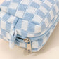 Stylish blue checkered pattern knitted cosmetic pouch with zipper closure, perfect for organizing makeup essentials.