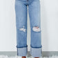 Trendy distressed straight jeans with pockets, slightly stretchy denim, featuring stylish ripped details, perfect for casual chic looks