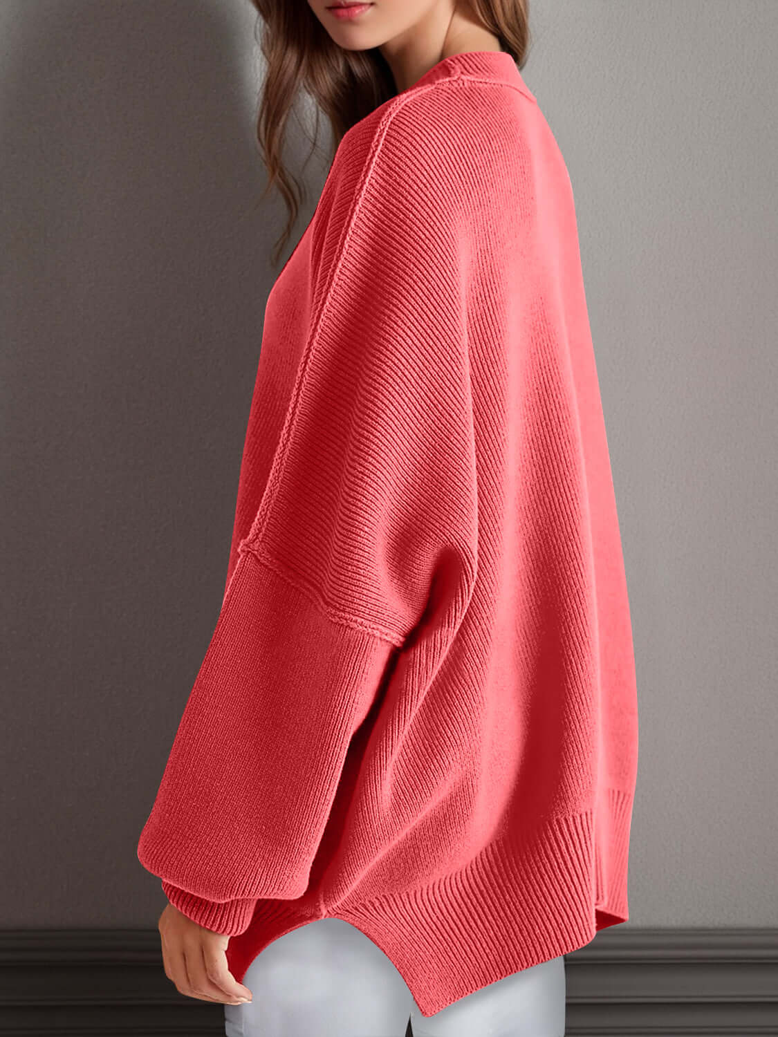 Red side slit round neck long sleeve sweater with a cozy fit, perfect for a fun and quirky look all season long.