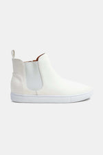 Trendy white faux suede elastic side panel sneakers, perfect for stylish everyday wear.