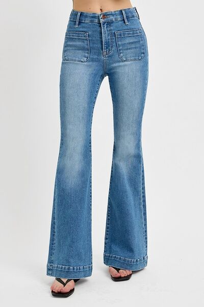 Retro-inspired RISEN full size flare jeans with front patch pockets and stylish flared leg design.