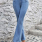 Bella Road high waist flare jeans with pockets in light wash showcasing retro style and moderate stretch.