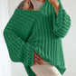 Woman wearing green Bella Road V-Neck Long Sleeve Sweater looking stylish and cozy in trendy fall colors.