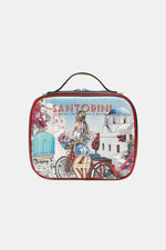 Nicole Lee USA handbag with Santorini print featuring a woman on a bicycle amidst scenic Greek architecture and floral accents.