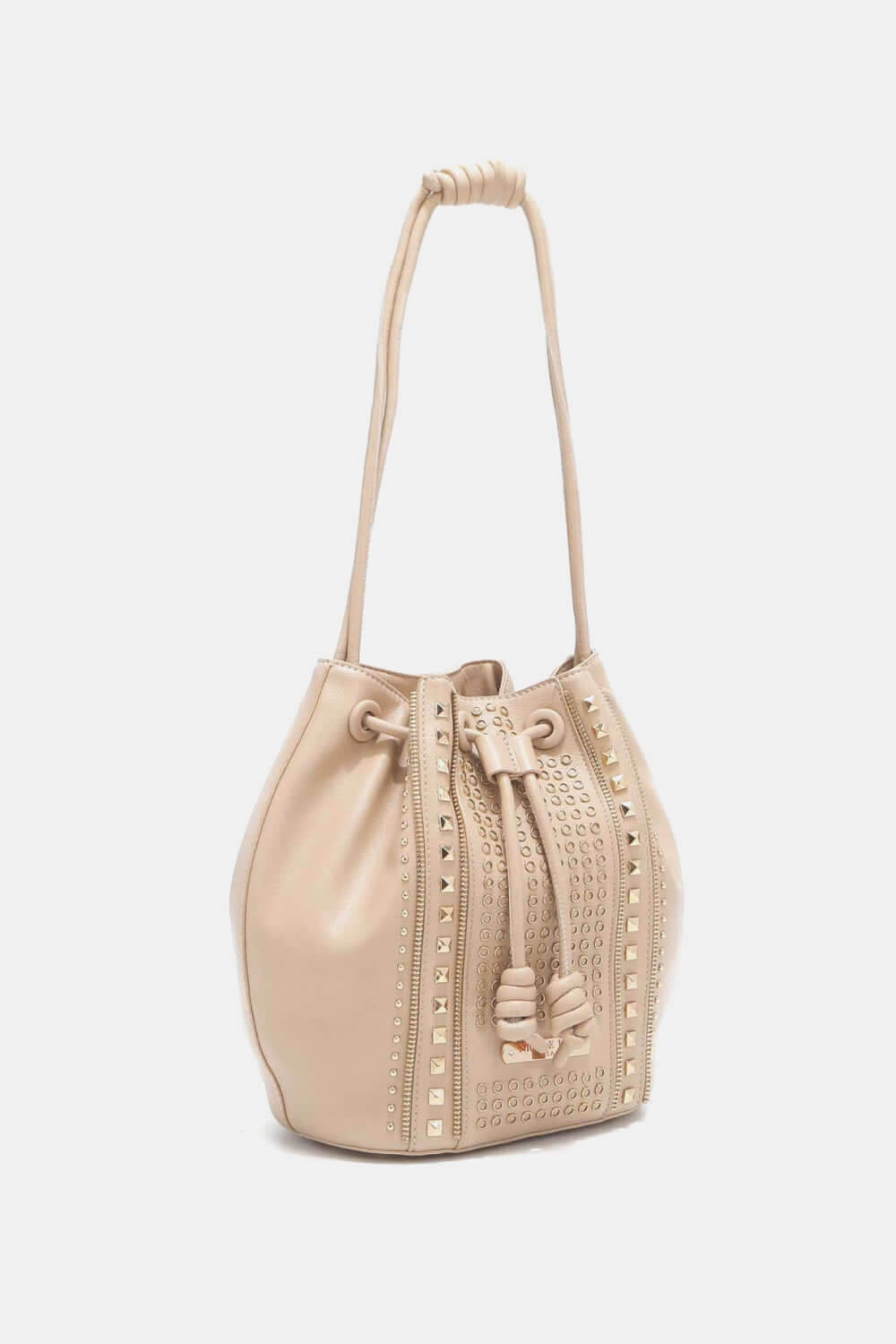 Nicole Lee USA Amy Studded Bucket Bag made from vegan leather with stud and zipper detailing, featuring a drawstring and snap button closure.