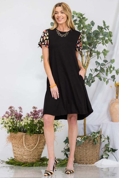 CELESTE Full Size Leopard Short Sleeve Dress with Pockets at Bella Road