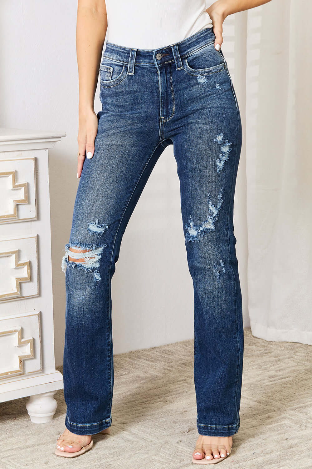 Mid-rise hand sand and destroy bootcut jeans | Petite by Judy Blue Jeans, featuring a distressed, slightly stretchy design. Suitable for all-day wear.