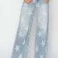 Fashionable Risen Jeans with raw hem and star embellishments in a wide leg silhouette, perfect for a casual and edgy look.