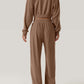 Back view of Bella Road Crisscross Round Neck Top and Drawstring Pants Set in brown, showcasing comfortable fit and stylish design