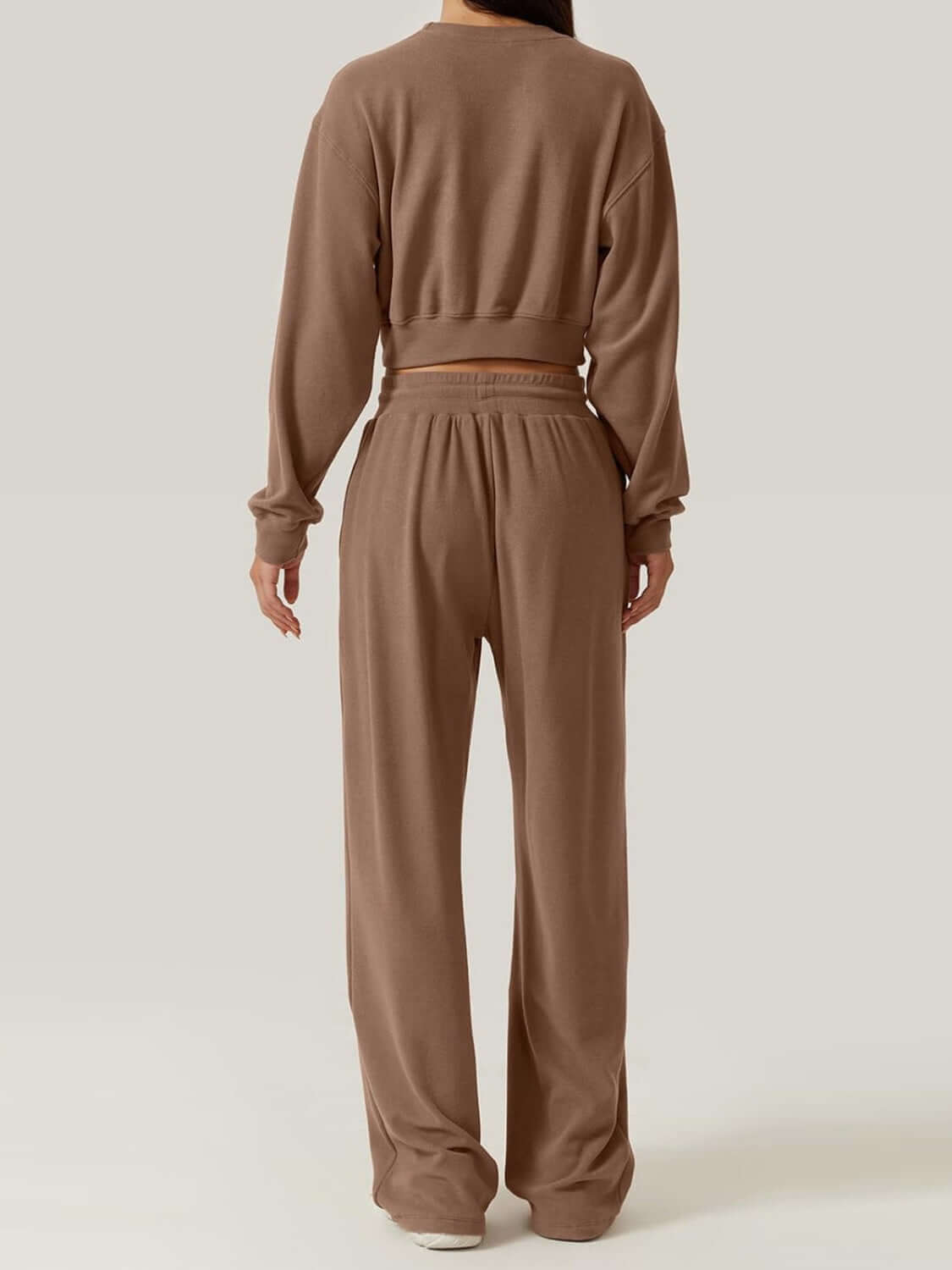 Back view of Bella Road Crisscross Round Neck Top and Drawstring Pants Set in brown, showcasing comfortable fit and stylish design