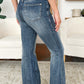 Back view of model wearing High Waist Tummy Control Flare Jeans by Judy Blue Jeans