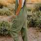 DOUBLE TAKE Full Size V-Neck Sleeveless Jumpsuit with Pockets at Bella Road