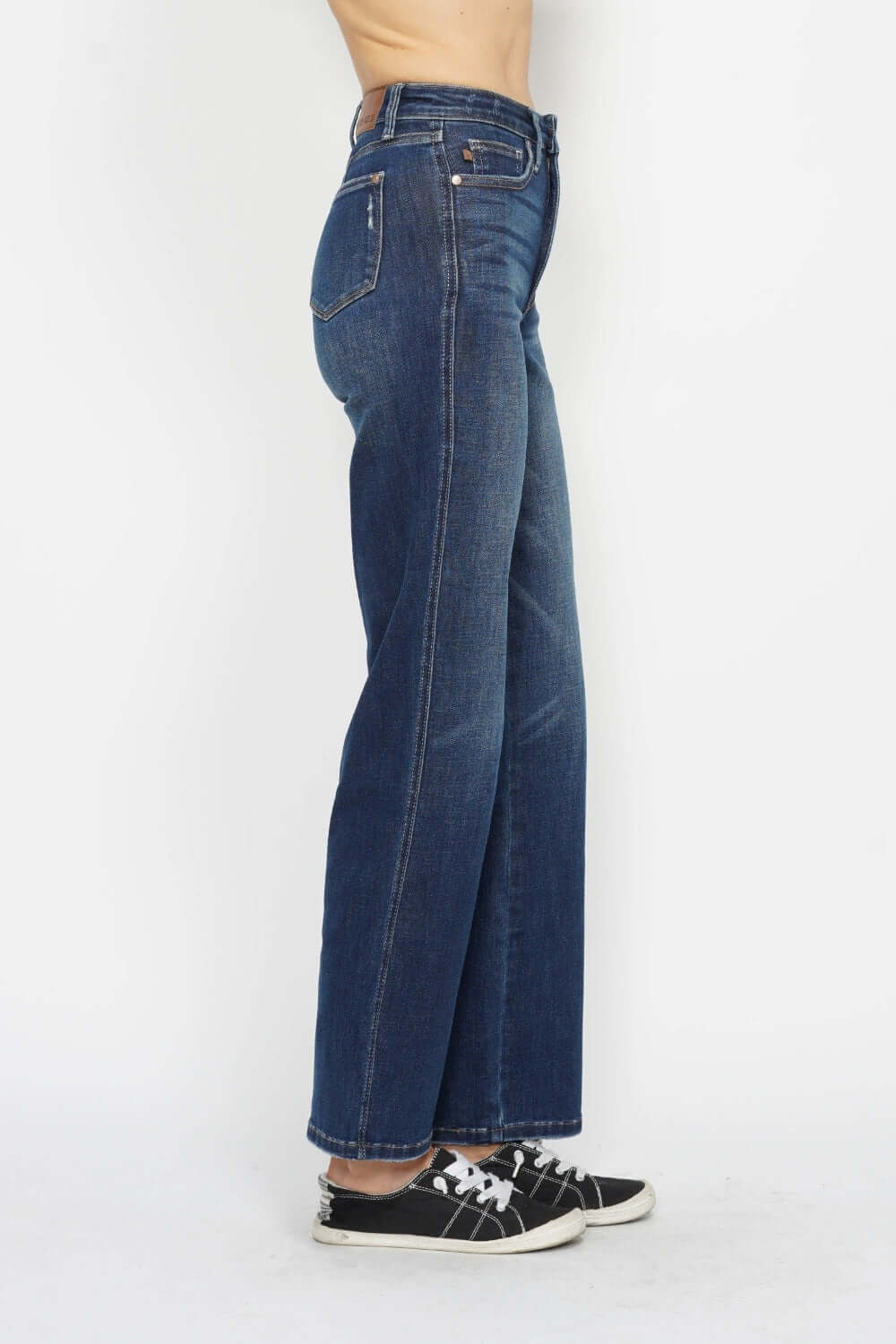 High Waist Tummy Control Jeans by Judy Blue featuring a dark wash, slim silhouette and high waistband for a flattering and stylish look.