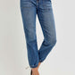 Stylish high-rise ankle jogger jeans with elastic cuffs, showcasing a sleek fit and comfortable stretch denim, paired with heels.