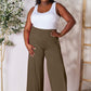 DOUBLE TAKE Full Size Smocked Wide Waistband Wide Leg Pants at Bella Road