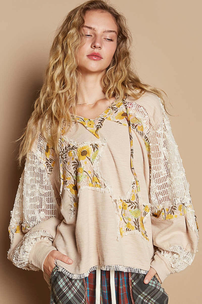 Trendy POL Star Patch Lace Long Sleeve Hooded Top with floral details and delicate lace sleeves on a model.