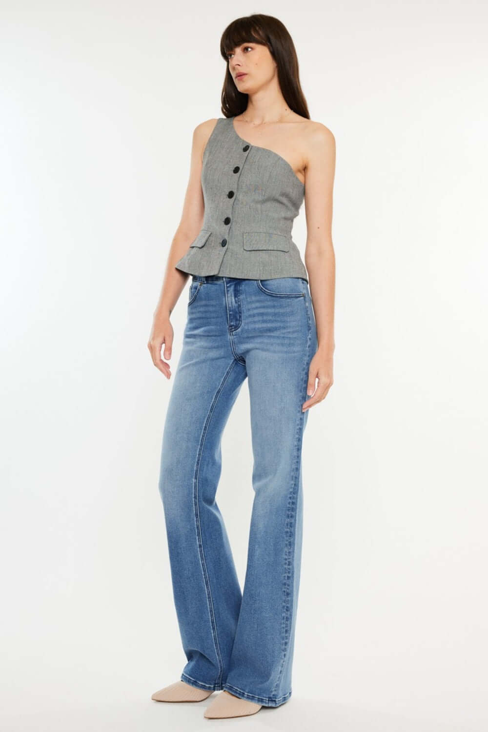 Model wearing Ultra High Rise Cat's Whiskers Jeans and a chic gray top