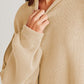 Cozy Double Take Side Slit Round Neck Long Sleeve Sweater in beige, made of 95% cotton and 5% polyester, showcasing textured knit details.