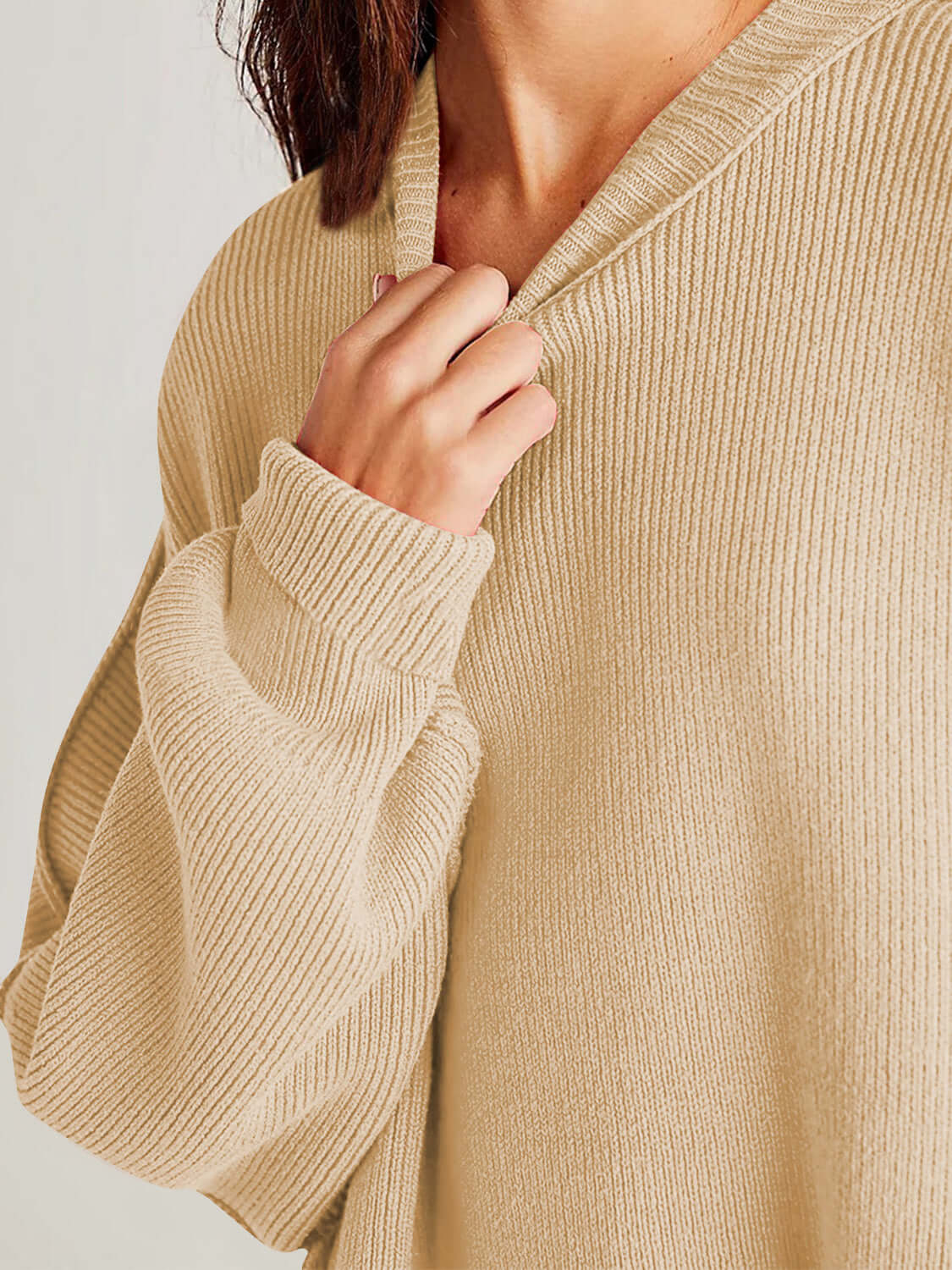 Cozy Double Take Side Slit Round Neck Long Sleeve Sweater in beige, made of 95% cotton and 5% polyester, showcasing textured knit details.