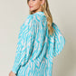 DOUBLE TAKE Full Size Printed Smocked Long Sleeve Blouse at Bella Road