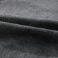 Close-up of Bella Road Raw Hem Midi Denim Skirt fabric showing soft, textured high-quality denim in dark wash.