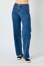 Judy Blue high rise straight jeans in blue denim, showcasing a flattering, versatile fit with a streamlined silhouette, perfect for any outfit.