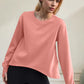 Trendy long sleeve round neck sweatshirt in sherbet color, perfect for casual outings and lounging.