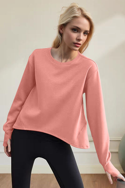 Trendy long sleeve round neck sweatshirt in sherbet color, perfect for casual outings and lounging.