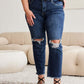 Woman wearing RFM Jeans Crop Dylan Full Size Tummy Control Distressed High Waist Raw Hem Jeans in a stylish outfit