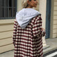 Woman wearing Bella Road Drawstring Plaid Long Sleeve Hooded Jacket in outdoor setting