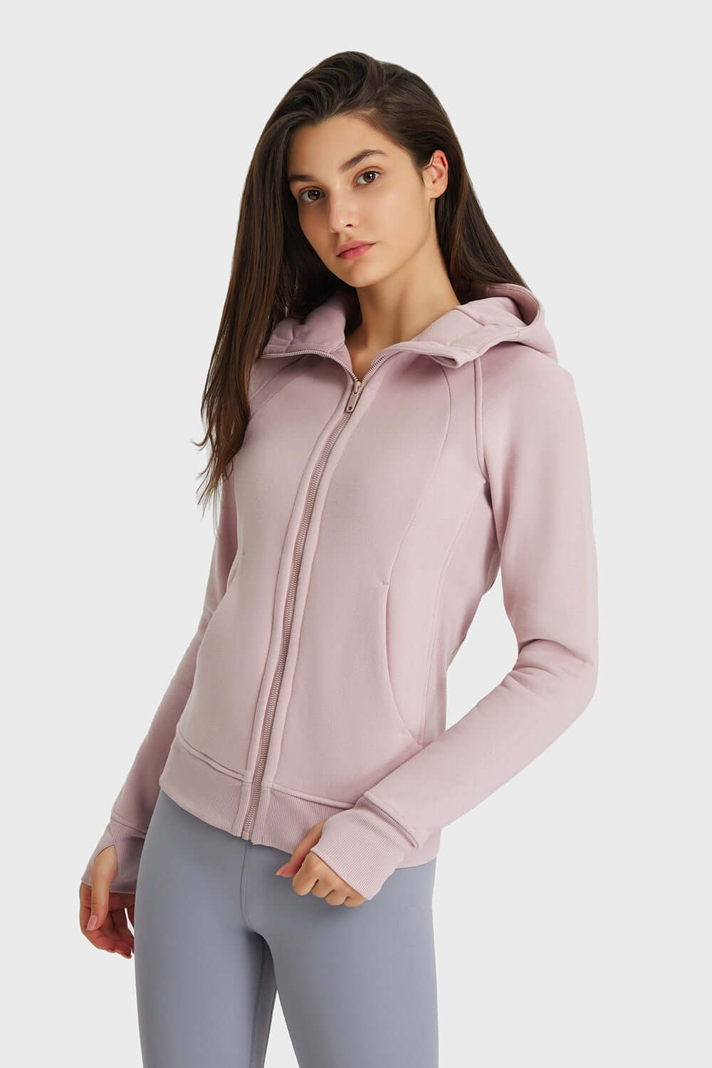 Millennia Zip Up Seam Detail Hooded Sports Jacket in soft pink, perfect for outdoor activities and stylish comfort.