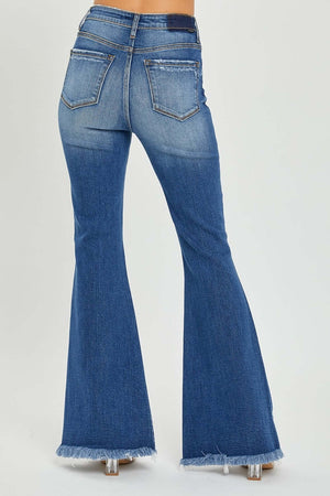 High Rise Front Slit Frayed Hem Flare Jeans by Risen Jeans, showcasing the back view with flared legs and stylish frayed hem detailing.