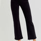 Model wearing RISEN Plus Size High Rise Tummy Control Crop Straight Jeans in black for a chic, flattering look.