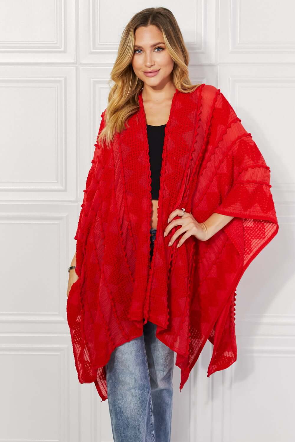 JUSTIN TAYLOR Pom-Pom Asymmetrical Poncho Cardigan in Red at Bella Road