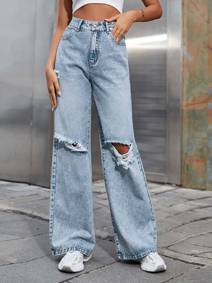 Trendy Bella Road Distressed Wide Leg Jeans with Pockets for free-spirited style and comfort.